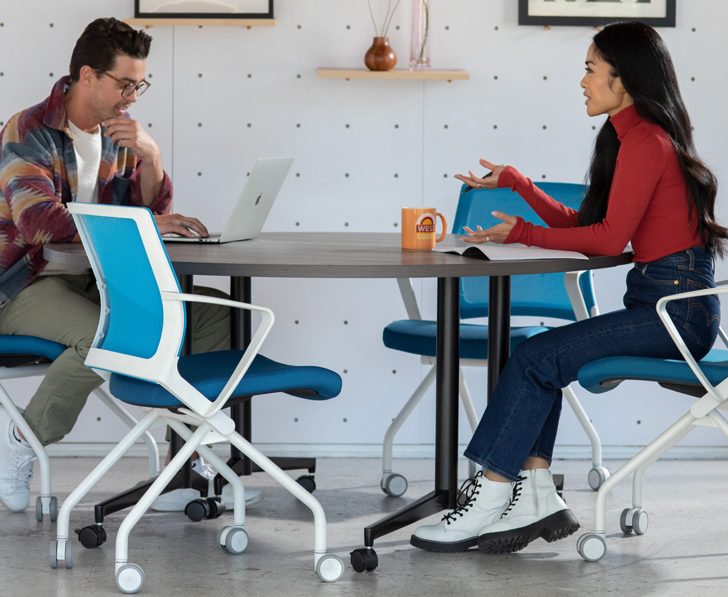 Sitting in office chair new arrivals